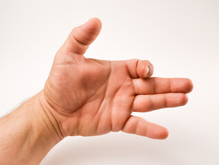 male hand with an open palm, a bent forefinger, a large upright and a little finger pushed down -...