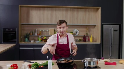 Cooking show hosts celebrity chef shows how to cook meat. Morning TV cooking programme. Shot on ARRI Alexa Mini