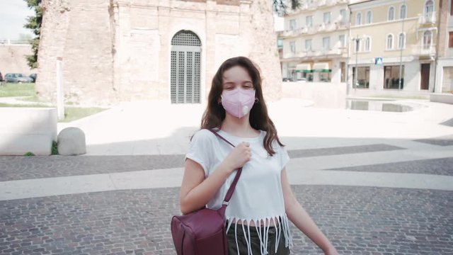 Children are walking outside after the pandemic in a city in Italy.