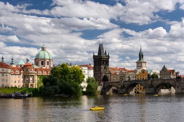 Tuinposter View of the Vltava River, Charles Bridge and the historical center of Prague, Czech Republic © Андрей Жерновой