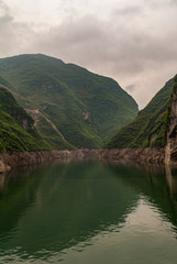 Guandukou, Hubei, China - May 7, 2010: Wu Gorge in Yangtze River: narrow stretch of green water...