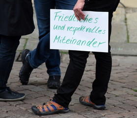 Schild auf einer Demo mit der Aufschrift: 