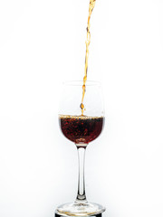 Liquor and port pouring into a glass