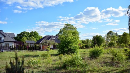 Fototapeta na wymiar View of house in suburban neighborhood. Suburban landscape.
