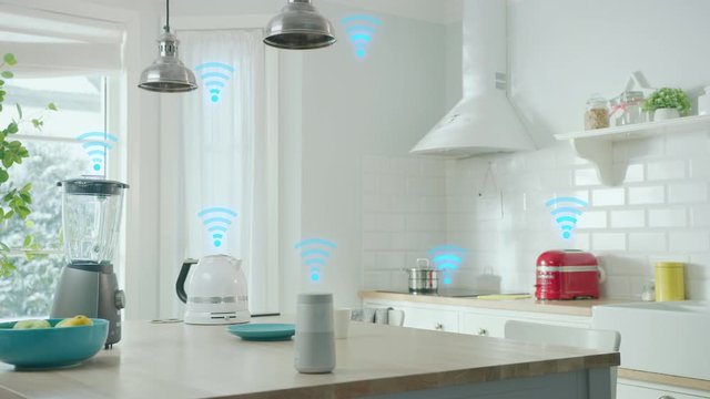 Internet of Things Concept: Modern Stylish White Kitchen full of High-Tech Kitchen Appliances with IOT, Wireless Logo Over Them. Digitalization, Visualization of Connected Home Electronics Devices