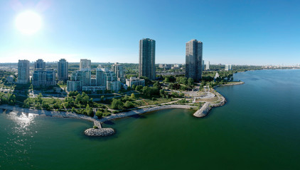 Humber Bay Shores Park city views, green space with skyline cityscape downtown. Skyscrapers over The Queensway on sunset at summer time, near Etobicoke or New Toronto, Ontario, Canada