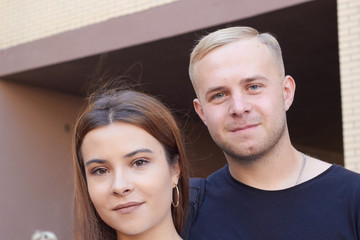 portrait of a young couple of students blonde and brunette