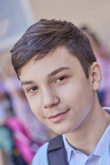 portrait of a teenage schoolboy, close-up, back to school