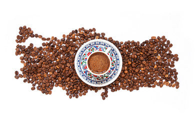 Turkish coffee concept, turkey map of the roasted coffee beans isolated on white background, traditional hot drink coffee in porcelain cup