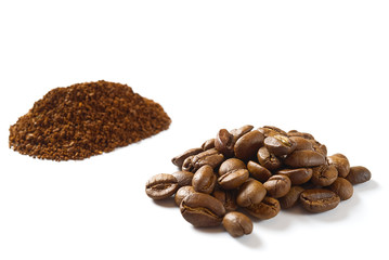 Obraz premium Pile of coffee beans and powdered coffee isolated on white background. closeup