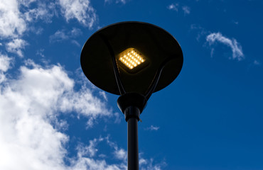 Street lamps with modern Led light on sky background
