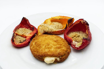 Cordon Bleu and red peppers stuffed with bread, parsley and extra vergin olive oil