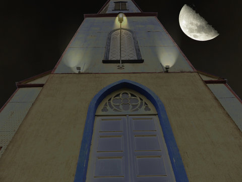 frente de edificio iluminado. noche de luna. vista inferior