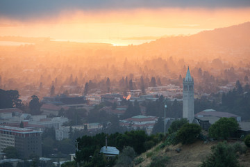A beautiful sunset occurs over the city and campus of Berkeley which lies on the east shores of San Francisco Bay in Northern California. 