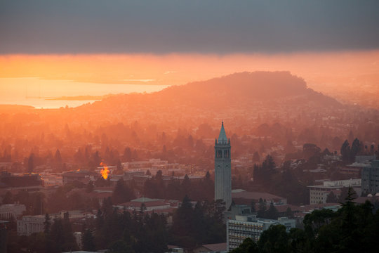 A beautiful sunset occurs over the city and campus of Berkeley which lies on the east shores of San Francisco Bay in Northern California. 