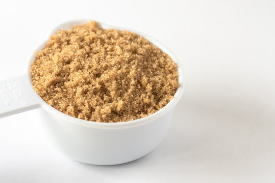 Packed Brown Sugar in a Measuring Cup