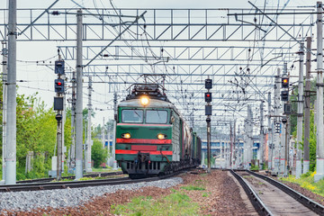 Long freight train moves from the station.