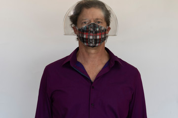 Safety glasses and a medical mask. Security and protection during the COVID-19 epidemic theme.