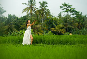 mind and body connection with nature - middle aged attractive and happy Asian Korean woman in...