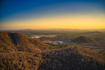 Fototapeta premium This unique photo shows the hilly landscape, from hua to thailand, taken with a drone by the evening sun during a wonderful sunset!