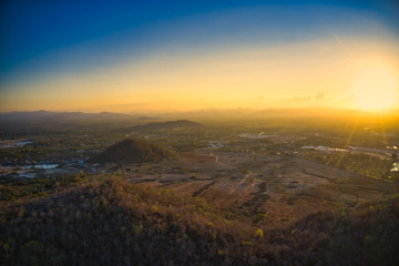 This unique photo shows the hilly landscape, from hua to thailand, taken with a drone by the evening sun during a wonderful sunset!
