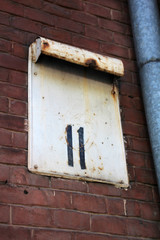 Old street signpost without street name