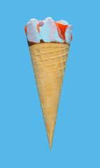 side view fresh marshmallow and raspberry flavor ice cream cone on blue background