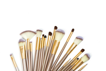 Cosmetic Makeup brushes on white background. Flat lay, top view, copy space. Makeup accessories, mockup, template