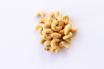 Roasted salted cashew nut isolated on a white background