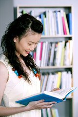 Female student reading book