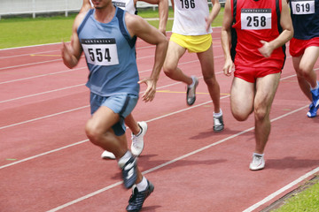 Men in track event