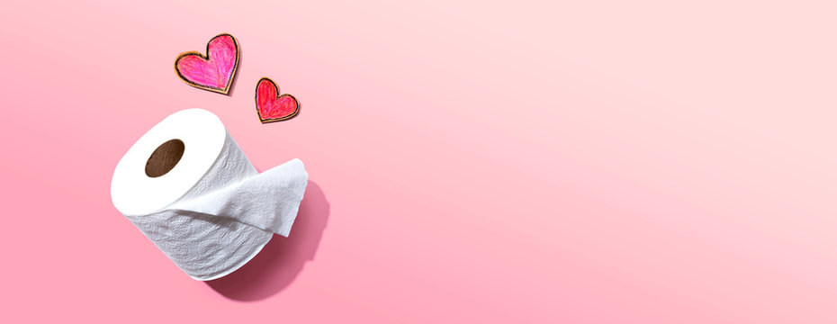Toilet paper with hearts - overhead view flatlay