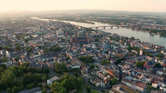 Sunny weather drone approaching the Dom of Mainz with Rhine river bridge in the background
