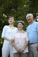 Obraz premium Woman, senior woman and man at the park