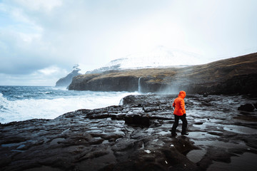 Stormy waves hitting the cliffs at Mølin beach in Streymoy island, Faroe Islands