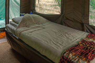 Safari camp at sunrise in the Botswana wilderness