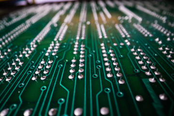 Extreme detailed view of printed circuit board and components in the electronic devices.