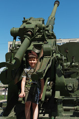Fototapeta premium boy and military equipment