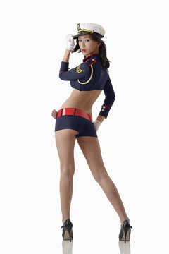 Woman in navy blue sailor outfit