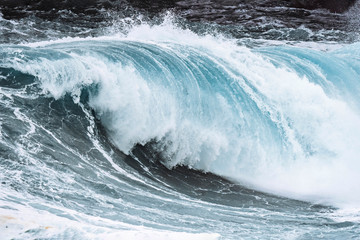 Fototapeta na wymiar Stormy waves at Mølin beach in Streymoy, Faroe Islands
