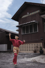 Boy playing with model airplane