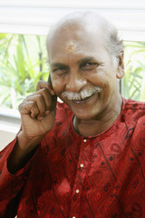 Senior man talking on the phone, smiling