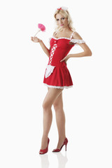 Woman in maid costume posing for the camera