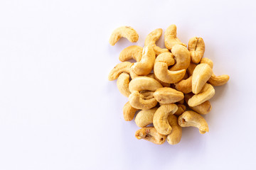 Many Roasted salted cashew nuts  isolated on a white background