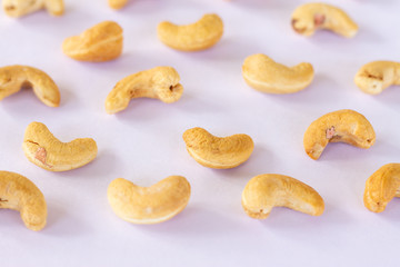 Roasted Cashew nuts isolated on white background with clipping path and full depth of field. Set or collection.
