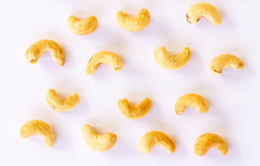 Roasted Cashew nuts isolated on white background with clipping path and full depth of field. Set or collection.