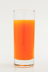 A glass of fresh organic orange juice