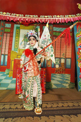 Opera performer posing on stage