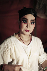 Opera performer with thick make-up