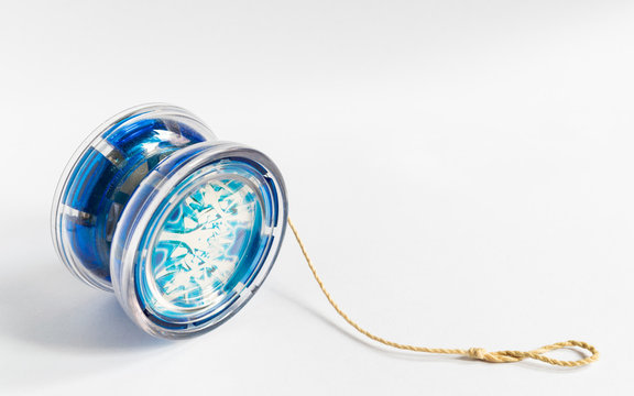 Close-up Of Yo-yo Over White Background